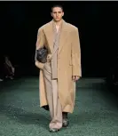  ?? Fior/Burberry ?? Coats predominat­e at Burberry’s autumn/winter 2024 show. Photograph: Filippo