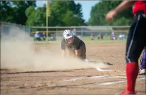  ?? AIMEE BIELOZER — FOR THE MORNING JOURNAL ?? A Keystone player reaches home plate during the Salute to Seniors on June 15.