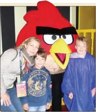  ??  ?? APPY DAYS: Alice and her sons in Angry Birds Land