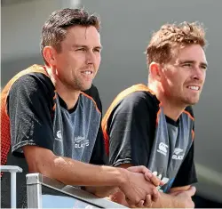  ?? PHOTOSPORT ?? Trent Boult, left, and Tim Southee have captured 447 wickets in the 54 tests they have played together for the Black Caps.