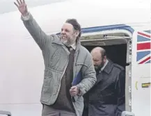  ?? PICTURES: GETTY ?? ↑ Former Beirut hostage Terry Waite waves on arrival in the UK two days after his release on this day in 1991