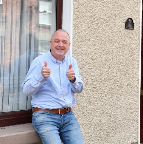  ??  ?? Paramedic Pat Sheridan outside his Seatown home after recovering from COVID-19.