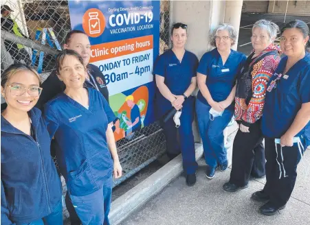  ??  ?? OPENING SOON: Excited about the new mass vaccinatio­n hub at Clifford Gardens Shopping Centre are (from left) Patricia Pasion, Debra White, Wendy Harding, Tamara Robinson, Lola Smalley, Chris Hicks and Glenda Lorenzo.