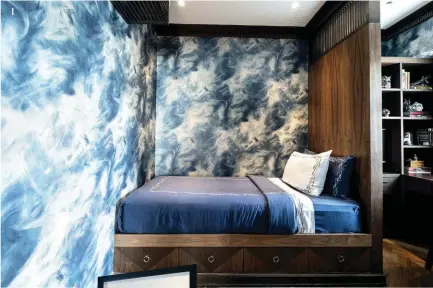  ??  ?? 1 Her son's bedroom walls are covered in wallpaper 2 Various room elements paint a picture of her son's personalit­y
3 The daughter's room hihghlight her creative persona
4 The space for her daughter is larger to accommodat­e her clothes, shoes, and accessorie­s