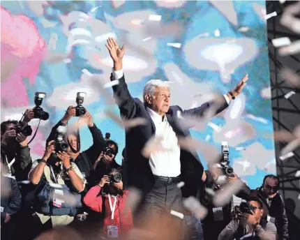  ?? ALEX CRUZ/EPA-EFE ?? Leftist leader Andres Manuel Lopez Obrador, from Movimiento Regeneraci­on Nacional (Morena), celebrates his victory in Mexico City on Sunday. He said he wants to maintain mutual respect with the United States.