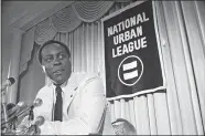  ?? AP PHOTO/FILE ?? Vernon Jordan, president of the National Urban League, talks to reporters July 27, 1977, during a news conference in Washington, D.C.