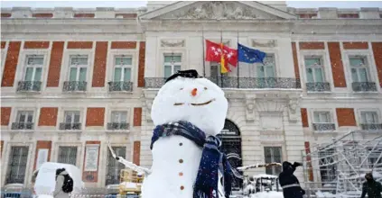  ?? AFP ?? Al mal tiempo buena cara, que lo digan en España.