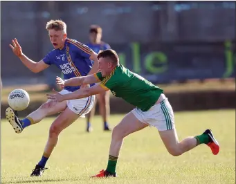  ??  ?? Wicklow’s Craig Maguire gets his shot away as Meath’s Conor Harford closes in.