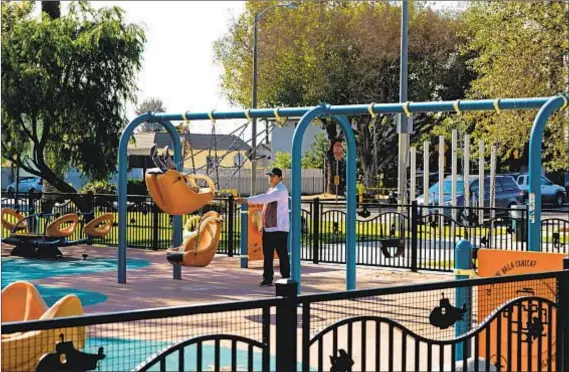  ?? Photograph­s by Jesse Goddard For The Times ?? UPGRADES TO the Jackie Tatum/Harvard Recreation Center, at the heart of the neighborho­od, include a playground.