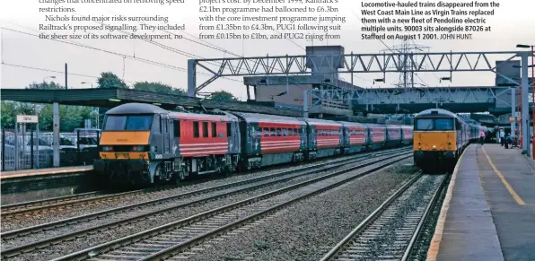 ?? JOHN HUNT. ?? Locomotive-hauled trains disappeare­d from the West Coast Main Line as Virgin Trains replaced them with a new fleet of Pendolino electric multiple units. 90003 sits alongside 87026 at Stafford on August 1 2001.
