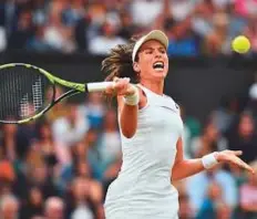  ?? AFP ?? Britain’s Johanna Konta returns against Romania’s Simona Halep during their women’s singles quarter-final match of the 2017 Wimbledon Championsh­ips in London on Tuesday.