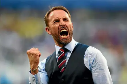  ?? GETTY IMAGES ?? England manager Gareth Southgate reacts after beating Sweden in the World Cup quarterfin­als.