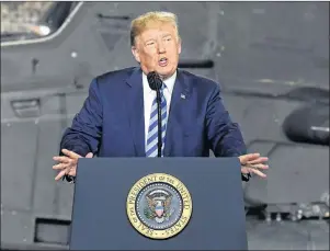  ?? AP PHOTO ?? President Donald Trump speaks before signing a US$716-billion defence policy bill named for Sen. John McCain in Fort Drum, N.Y., earlier this month.