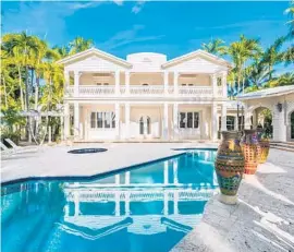  ?? PHOTOS BY LIFESTYLE PRODUCTION GROUP ?? Gloria and Emilio Estefan's 7,988-square-foot gated estate on Miami Beach’s exclusive Star Island has hit the market for $32 million. The power couple bought the sprawling waterfront residence almost 26 years ago for Emilio’s mother but now use it for guests.