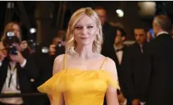  ??  ?? This file photo taken on May 20, 2016 shows US actress and member of the Jury Kirsten Dunst posing as she arrives for the screening of the film “The Neon Demon” at the 69th Cannes Film Festival in Cannes, southern France.