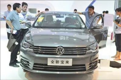  ?? ZHAO RONG / FOR CHINA DAILY ?? Volkswagen’s leasing operations provide its namsake cars as well as other brands owned by the group including Porsche.