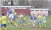  ??  ?? Kieran Howard gets a header on target