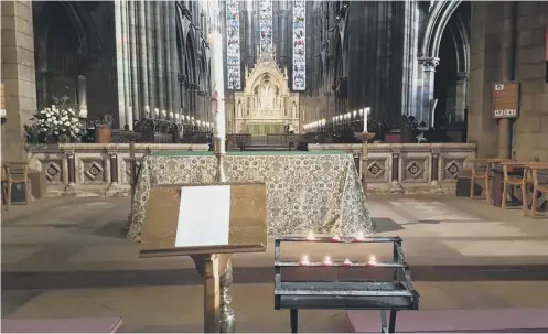  ??  ?? Candles have been lit at St Mary’s Cathedral, Edinburgh, near where a woman was hit by a no 26 bus