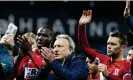  ?? CameraSpor­t/Getty Images ?? Neil Warnock and his players applaud the Middlesbro­ugh fans after the game at West Brom in November 2021, shortly before losing his job. Photograph: Andrew Kearns/