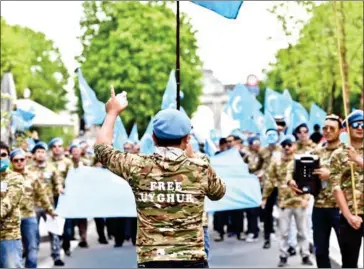  ??  ?? Ethnic Uighurs take part in a protest march last year asking for the EU to call upon China to respect human rights in the Chinese Xinjiang region and asking for the closure of ‘re-education centres’ where some Uighurs are allegedly detained.