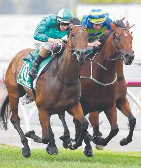  ?? Picture: MICHAEL KLEIN ?? Humidor (left) runs down Jameka in the closing stages to win the Australian Cup.