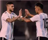  ?? GETTY ?? In grande Lautaro Martinez, 21 anni, fa festa dopo un gol con l’Inter. In piccolo, il Toro e Icardi insieme con l’Argentina