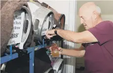  ??  ?? Des Barker tops up his glass at last year’s beer festival