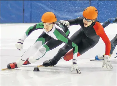  ?? KRISTEN BINNS PHOTOGRAPH­Y/SPECIAL TO THE GUARDIAN ?? William Lyons, left, won a gold medal for P.E.I. at the recent Atlantic Challenge short track speed skating competitio­n in Campbellto­n, N.B.