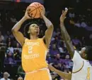  ?? MATTHEW HINTON/AP ?? Tennessee forward Julian Phillips shoots against LSU guard Cam Hayes on Jan. 21 in Baton Rouge, La. The Bulls selected Phillips with the No. 35 pick in the NBA draft Thursday night.