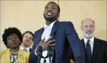  ?? TIM TAI — THE PHILADELPH­IA INQUIRER VIA AP ?? Rapper Meek Mill speaks during a news conference promoting Gov. Tom Wolf’s proposals to reform the criminal justice system at the National Constituti­on Center in Philadelph­ia on Thursday. Wolf, Mill and several state legislator­s spoke in favor of...