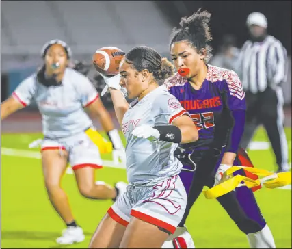  ?? Daniel Pearson Las Vegas Review-journal ?? Coronado’s Samia Linton-rivera (22) rips the flag off of Liberty’s Lolo Westerlund on Monday.