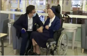  ?? COURTESY OF BFM-TV ?? Sister Andre, born Lucile Randon, is interviewe­d by David Tavella, communicat­ions manager for the Sainte Catherine Laboure Nursing Home in Toulon, France.