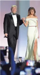  ?? PATRICK SEMANSKY/AP ?? President Trump and first lady Melania Trump arrive at one of the three official inaugural balls last January.