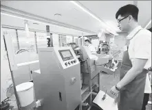  ?? PROVIDED TO CHINA DAILY ?? The showcase of miniaturiz­ed Garment-To-Garment Recycling System.