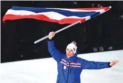  ?? AFP ?? Thailand‘s flagbearer Mark Chanloung.