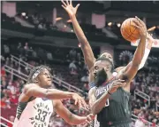  ?? USA TODAY SPORTS ?? Houston’s James Harden, right, in action against the Pacers.