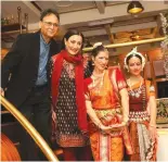  ?? (Courtesy) ?? VINOD (LEFT) and Reena Pushkarna (second left) with Indian entertaine­rs.