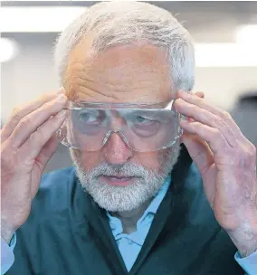  ?? Picture: DANNY LAWSON/PA ?? Mr Corbyn dons safety goggles on a visit to Leeds City College yesterday