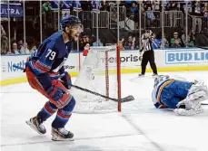  ?? Bruce Bennett/getty Images ?? K’andre Miller celebrates a second-period goal against Islanders goalie Ilya Sorokin on Sunday.