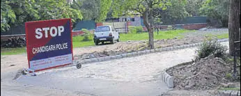  ?? HT PHOTO ?? The minister has encroached upon a green belt by constructi­ng a road using interlocki­ng tiles outside his house in Sector 2, Chandigarh.