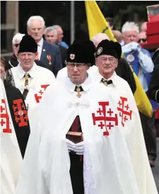  ??  ?? Pictured: Members of the Knights of St Columbanus and Knights of The Holy Sepulcher Of Jerusalem attended the procession, with below, Gerry Watson, Hugh O’Donnell and John Andrews and bottom right, St Oliver on display at the Dominican Church.