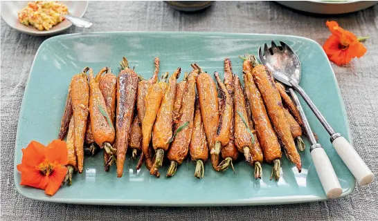  ?? NICOLA GALLOWAY ?? Roasted baby carrots with tarragon nasturtium butter.