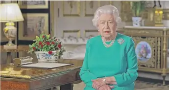  ?? BUCKINGHAM PALACE VIA AP ?? In a speech to Britons on Sunday, Queen Elizabeth II urged them to be “united and resolute” in the fight against the coronaviru­s.