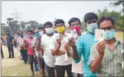  ??  ?? Voters at a polling booth, in Sonarpur, on Saturday