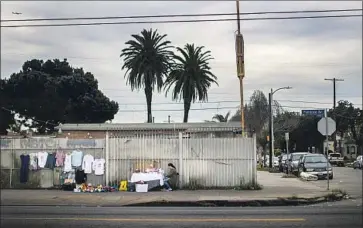  ?? Gina Ferazzi Los Angeles Times ?? THIS FENCED-IN lot on Florence Avenue was slated for a homeless housing project, but Councilman Curren Price blocked its funding, complainin­g it was short on amenities and lacked the right mix of bedroom units.