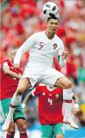  ?? FRANCISCO SECO/THE ASSOCIATED PRESS ?? Portugal star Cristiano Ronaldo continues to make up for his team’s ordinary play with the only goal of the match Wednesday in a 1-0 win over Morocco at Luzhniki Stadium in Moscow.