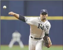  ?? The Associated Press ?? CLUTCH PITCHING: Tampa Bay Rays starting pitcher Charlie Morton (50) throws Monday during the first inning of Game 3 of the American League Division Series against the Houston Astros in St. Petersburg, Fla.
