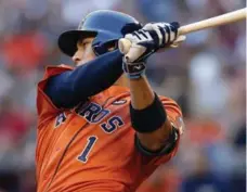  ?? RICK SCUTERI/THE ASSOCIATED PRESS ?? Houston Astros shortstop Carlos Correa, who turned 21 in September, hit .279 in 2015 with 22 home runs, 68 RBIs and 14 stolen bases.