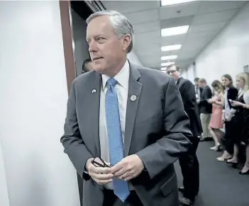  ?? THE ASSOCIATED PRESS FILES ?? House Freedom Caucus Chairman Rep. Mark Meadows, R-N.C., leaves a closed-door strategy session with House Speaker Paul Ryan of Wis., on March 28. Meadows’ group was the target of U.S. President Donald Trump’s tweets Thursday.