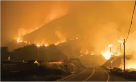  ?? Photograph: Nic Coury/ ?? The Colorado fire burns along Highway 1 near Big Sur, California.